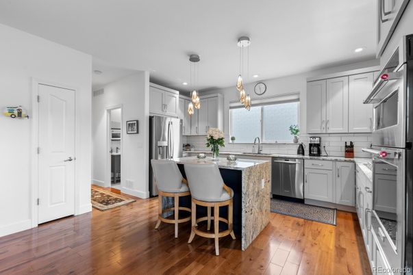 Interior, Kitchen, Pendant Lights, Recessed Lighting, Stainless Steel Appliances, Wood Texture Flooring