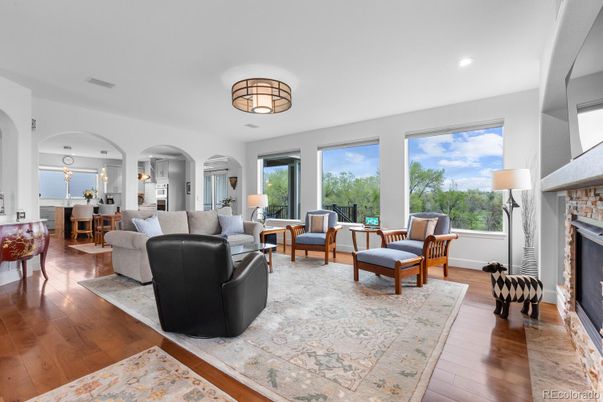Dining room, Fireplace, Interior, Living room, Recessed Lighting, Wood Texture Flooring