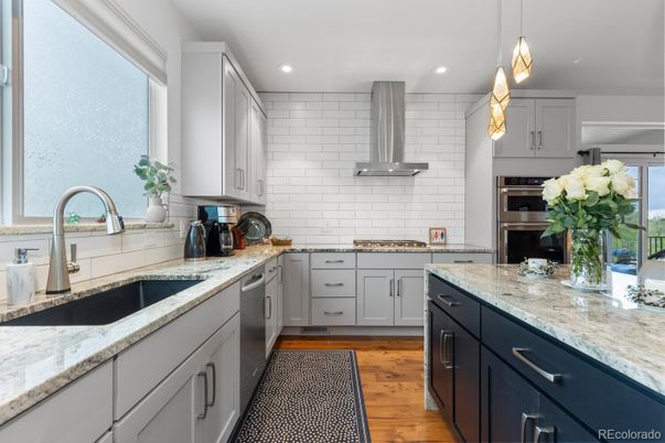 Interior, Kitchen, Pendant Lights, Recessed Lighting, Stainless Steel Appliances, Wood Texture Flooring