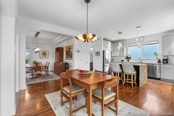 Dining room, Interior, Kitchen, Pendant Lights, Recessed Lighting, Stainless Steel Appliances, Wood Texture Flooring