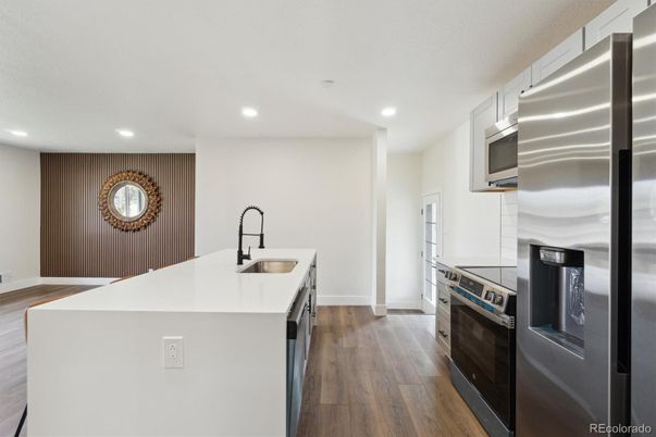 Interior, Kitchen, Recessed Lighting, Stainless Steel Appliances, Wood Texture Flooring