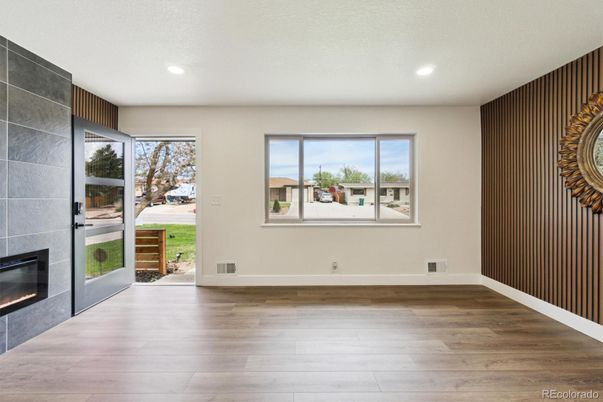 Empty room, Fireplace, Interior, Recessed Lighting, Wood Texture Flooring