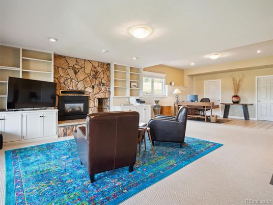Dining room, Fireplace, Interior, Living room, Recessed Lighting, Stone Walls