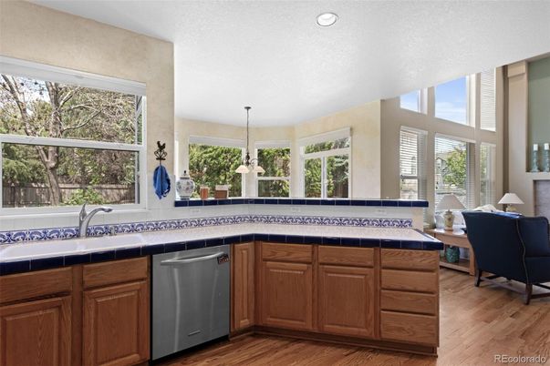 Interior, Kitchen, Pendant Lights, Recessed Lighting, Tile Countertops, Wood Texture Flooring