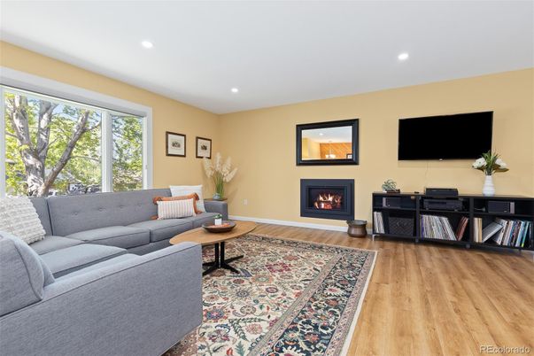 Fireplace, Interior, Living room, Recessed Lighting, Wood Texture Flooring
