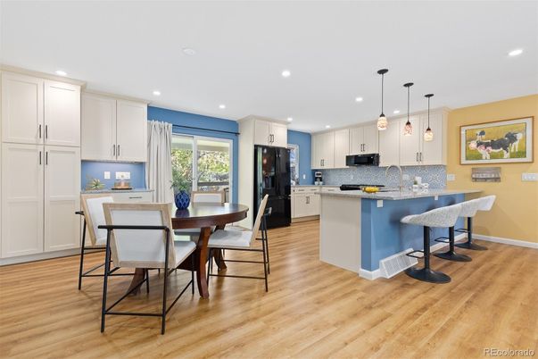 Dining room, Interior, Kitchen, Pendant Lights, Recessed Lighting, Stainless Steel Appliances, Wood Texture Flooring