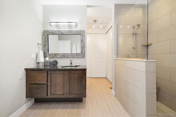 Bathroom, Dual Sink Vanities, Glass Shower, Interior, Wood Texture Flooring