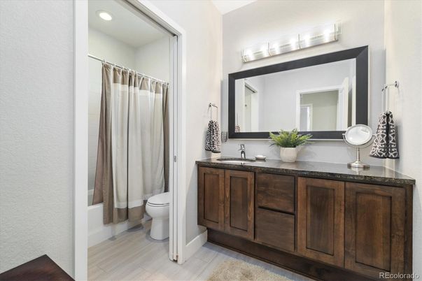 Bathroom, Dual Sink Vanities, Interior, Recessed Lighting, Wood Texture Flooring