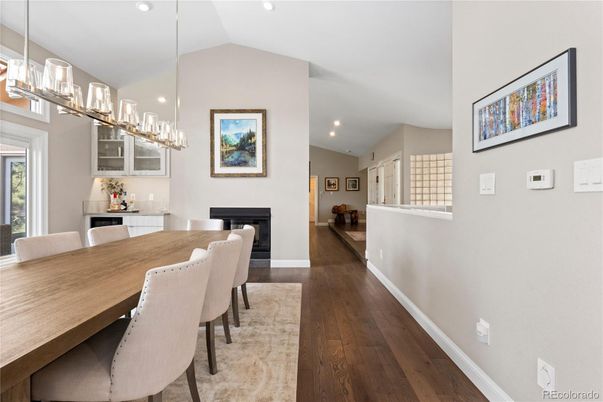 Dining room, Fireplace, Interior, Pendant Lights, Piano, Recessed Lighting, Wood Texture Flooring