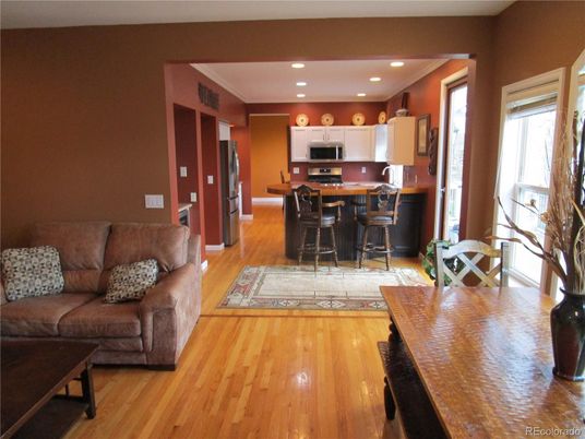 Dining room, Interior, Kitchen, Living room, Recessed Lighting, Stainless Steel Appliances, Wood Texture Flooring