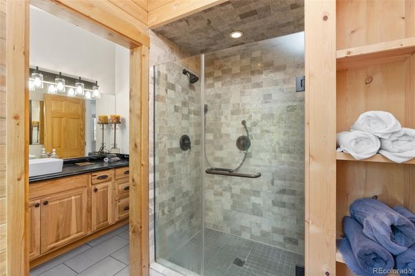 Bathroom, Glass Shower, Interior, Recessed Lighting, Stone Walls