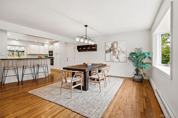 Dining room, Interior, Kitchen, Pendant Lights, Recessed Lighting, Stainless Steel Appliances, Wood Texture Flooring
