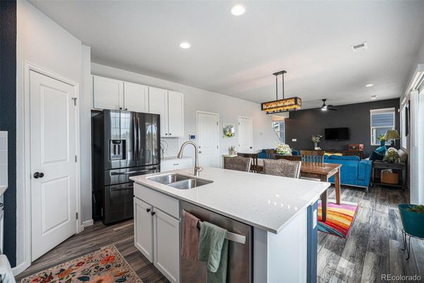 Dining room, Interior, Kitchen, Living room, Pendant Lights, Recessed Lighting, Stainless Steel Appliances, Wood Texture Flooring