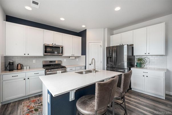 Interior, Kitchen, Recessed Lighting, Stainless Steel Appliances, Wood Texture Flooring