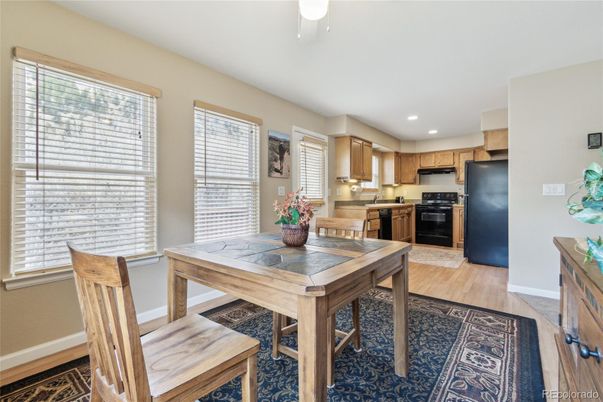 Dining room, Interior, Kitchen, Recessed Lighting, Stainless Steel Appliances, Wood Texture Flooring