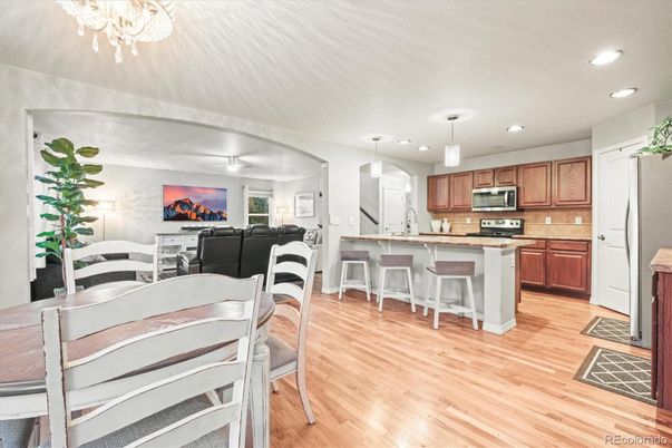 Dining room, Interior, Kitchen, Living room, Pendant Lights, Recessed Lighting, Stainless Steel Appliances, Wood Texture Flooring