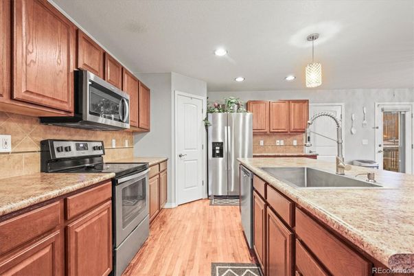 Interior, Kitchen, Pendant Lights, Recessed Lighting, Stainless Steel Appliances, Wood Texture Flooring