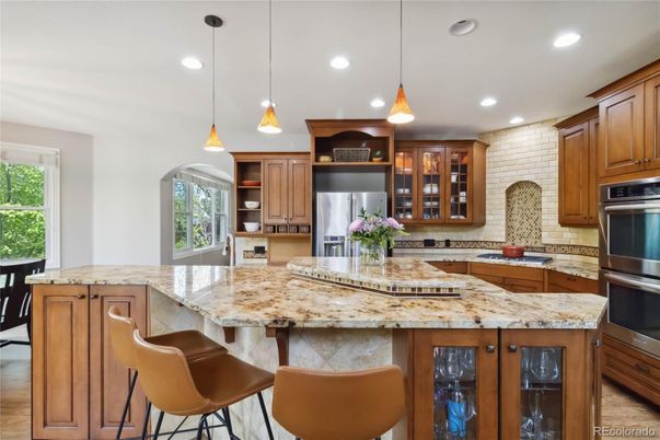 Interior, Kitchen, Pendant Lights, Recessed Lighting, Stainless Steel Appliances, Stone Walls, Wood Texture Flooring