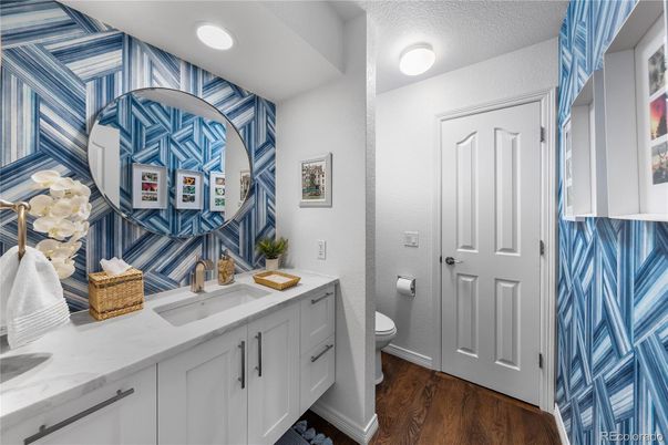 Bathroom, Dual Sink Vanities, Interior, Recessed Lighting, Wood Texture Flooring