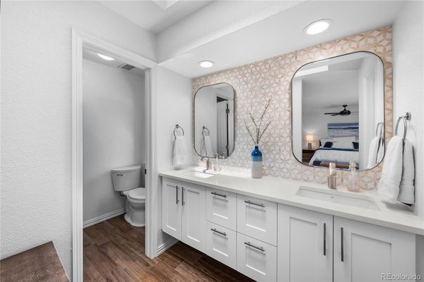 Bathroom, Dual Sink Vanities, Interior, Recessed Lighting, Wood Texture Flooring