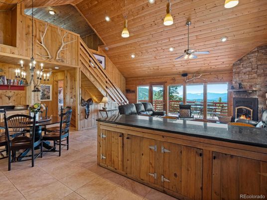 Chandelier, Dining room, Fireplace, Interior, Recessed Lighting, Wooden Ceilings, Wooden Walls