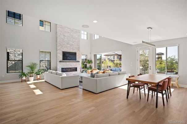 Dining room, Fireplace, Interior, Living room, Pendant Lights, Recessed Lighting, Stone Walls, Wood Texture Flooring