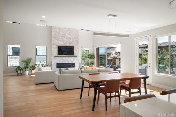 Dining room, Fireplace, Interior, Living room, Pendant Lights, Recessed Lighting, Stone Walls, Wood Texture Flooring