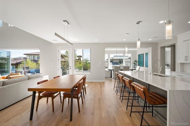 Dining room, Interior, Kitchen, Pendant Lights, Recessed Lighting, Stainless Steel Appliances, Wood Texture Flooring