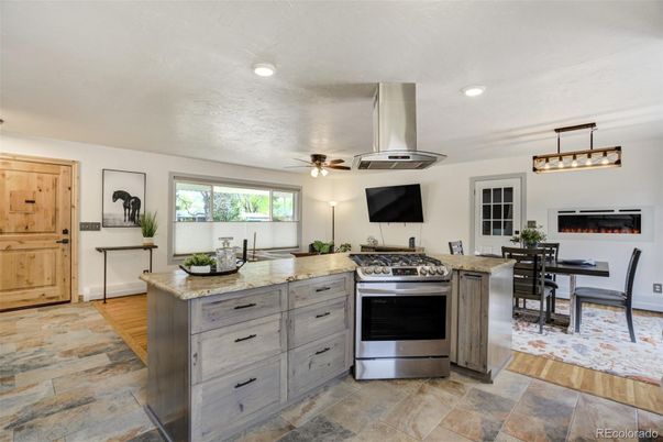 Dining room, Fireplace, Interior, Kitchen, Pendant Lights, Recessed Lighting, Stainless Steel Appliances