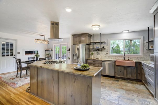 Dining room, Interior, Kitchen, Pendant Lights, Recessed Lighting, Stainless Steel Appliances, Wood Texture Flooring