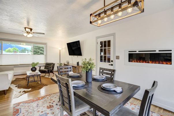 Dining room, Fireplace, Interior, Living room, Pendant Lights, Wood Texture Flooring