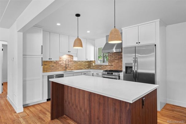Interior, Kitchen, Pendant Lights, Recessed Lighting, Stainless Steel Appliances, Wood Texture Flooring