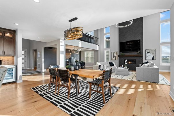 Dining room, Fireplace, Interior, Living room, Pendant Lights, Recessed Lighting, Wood Texture Flooring