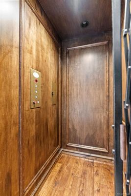 Elevator, Interior, Recessed Lighting, Wood Texture Flooring, Wooden Walls