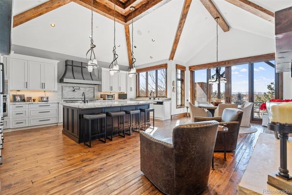 Dining room, Interior, Kitchen, Living room, Pendant Lights, Recessed Lighting, Stainless Steel Appliances, Wooden Beams, Wood Texture Flooring