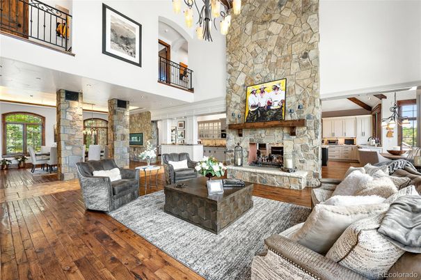 Chandelier, Dining room, Fireplace, Interior, Living room, Pendant Lights, Stone Walls, Wood Texture Flooring