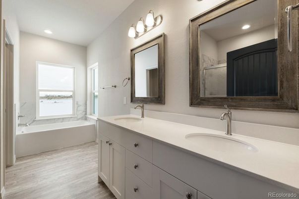 Bathroom, Dual Sink Vanities, Interior, Recessed Lighting, Wood Texture Flooring