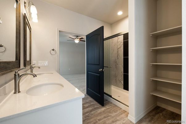 Bathroom, Dual Sink Vanities, Interior, Recessed Lighting, Wood Texture Flooring