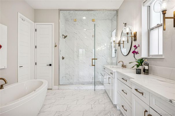 Bathroom, Dual Sink Vanities, Free Standing Baths, Glass Shower, Interior, Marble, Marble Walls, Recessed Lighting