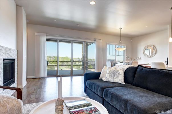 Dining room, Fireplace, Interior, Living room, Pendant Lights, Recessed Lighting, Wood Texture Flooring