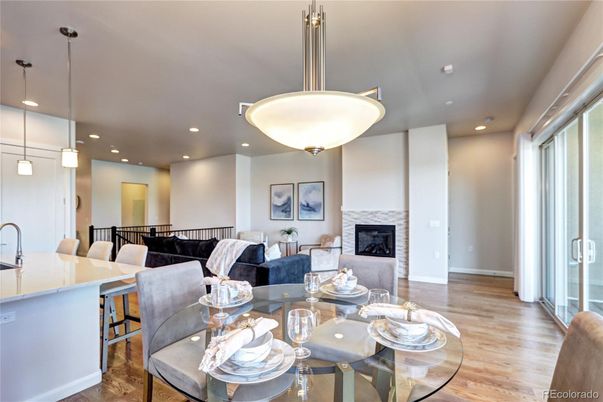 Dining room, Fireplace, Interior, Living room, Pendant Lights, Recessed Lighting, Wood Texture Flooring