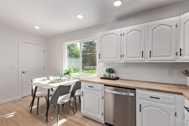 Dining room, Interior, Kitchen, Recessed Lighting, Stainless Steel Appliances, Wood Texture Flooring