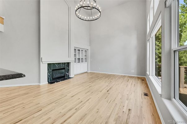 Empty room, Fireplace, Interior, Pendant Lights, Wood Texture Flooring