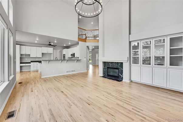 Chandelier, Fireplace, Interior, Kitchen, Pendant Lights, Recessed Lighting, Wood Texture Flooring