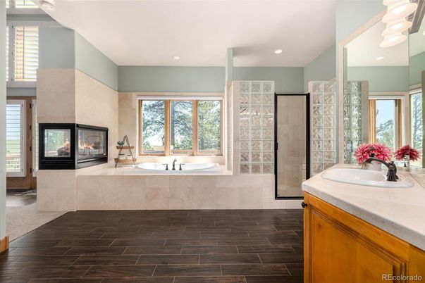 Bathroom, Fireplace, Interior, Recessed Lighting, Tile Countertops, Wood Texture Flooring