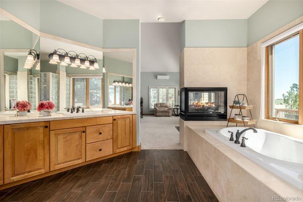 Bathroom, Dual Sink Vanities, Fireplace, Interior, Wood Texture Flooring