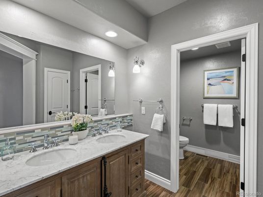 Bathroom, Dual Sink Vanities, Interior, Recessed Lighting, Wood Texture Flooring