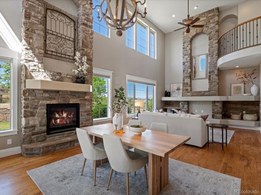 Chandelier, Dining room, Fireplace, Interior, Living room, Recessed Lighting, Stone Walls, Wood Texture Flooring