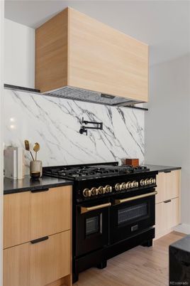 Interior, Kitchen, Marble Walls, Stainless Steel Appliances, Wood Texture Flooring