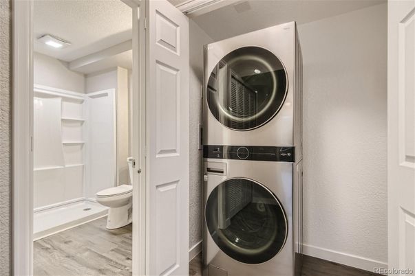 Bathroom, Interior, Recessed Lighting, Utility Closets, Washer, Wood Texture Flooring